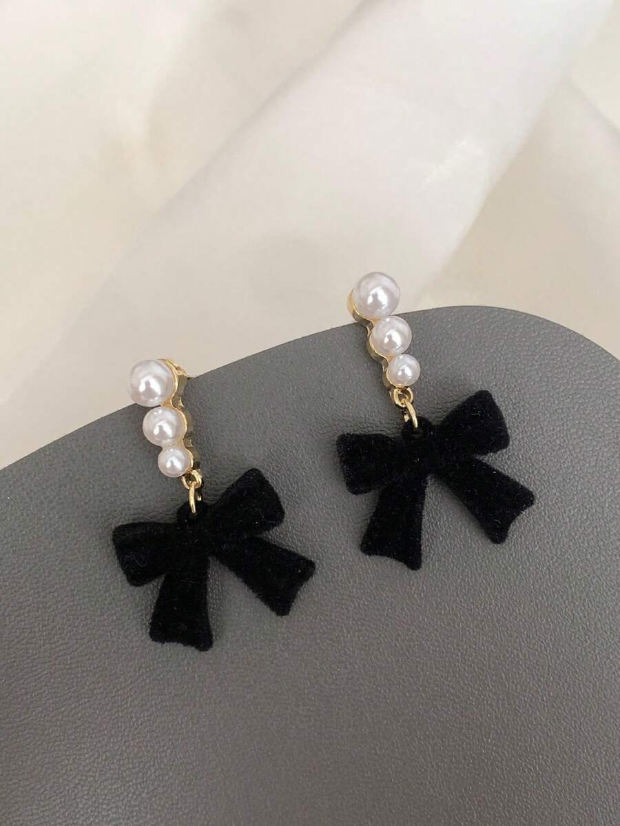 ETHEREAL BOW EARRINGS