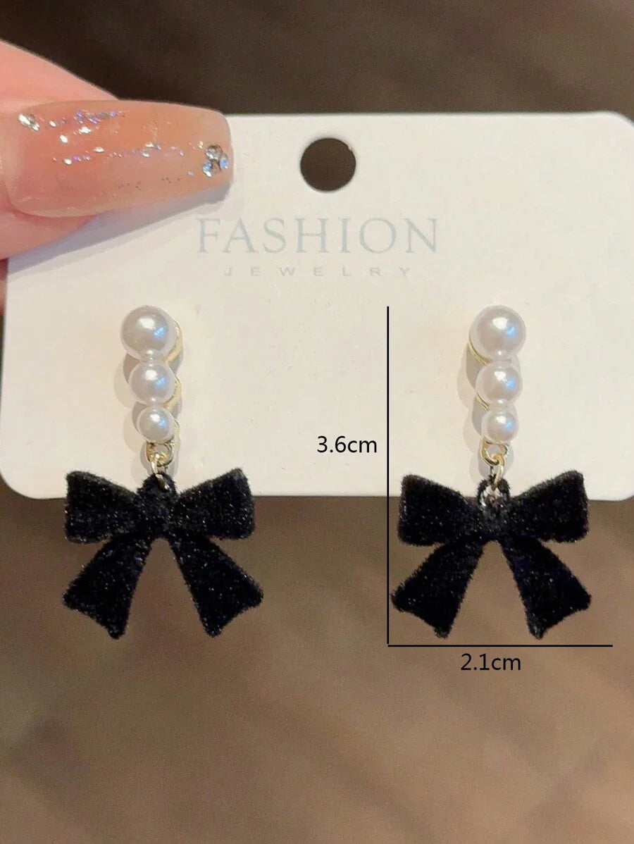 ETHEREAL BOW EARRINGS